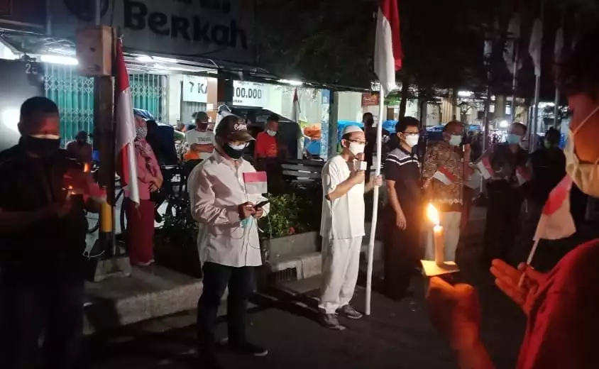 Pengusaha di Malioboro Nyalakan Lilin dan Berdoa Bersama